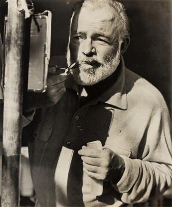 (ERNEST HEMINGWAY) A file from Wide World Pictures with about 100 photographs retracing Hemingway’s personal and professional life.